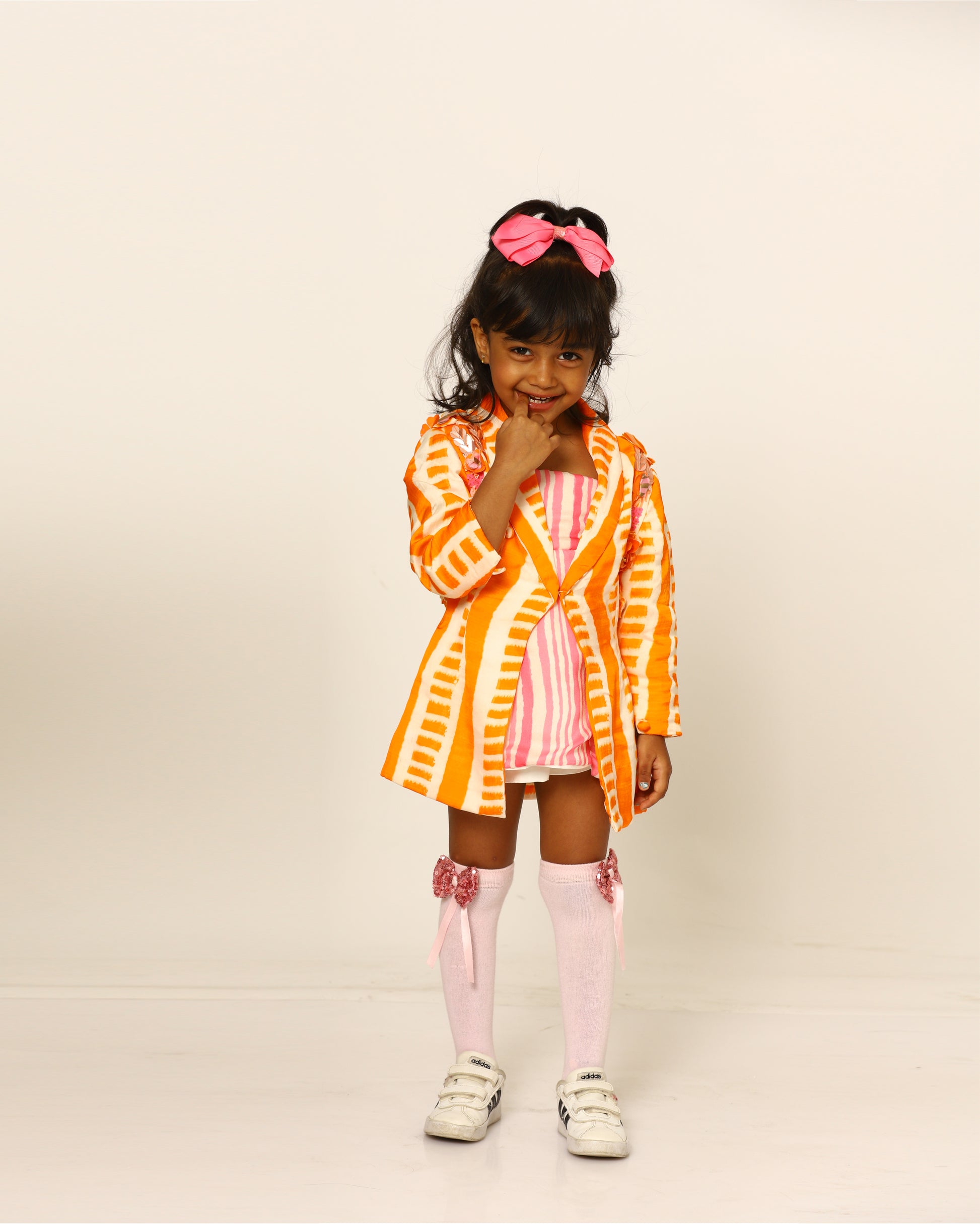 orange + candy + blazer + striped + flowers + pink + striped + skort + bow + socks + shoe + party + cheerful + jump + front