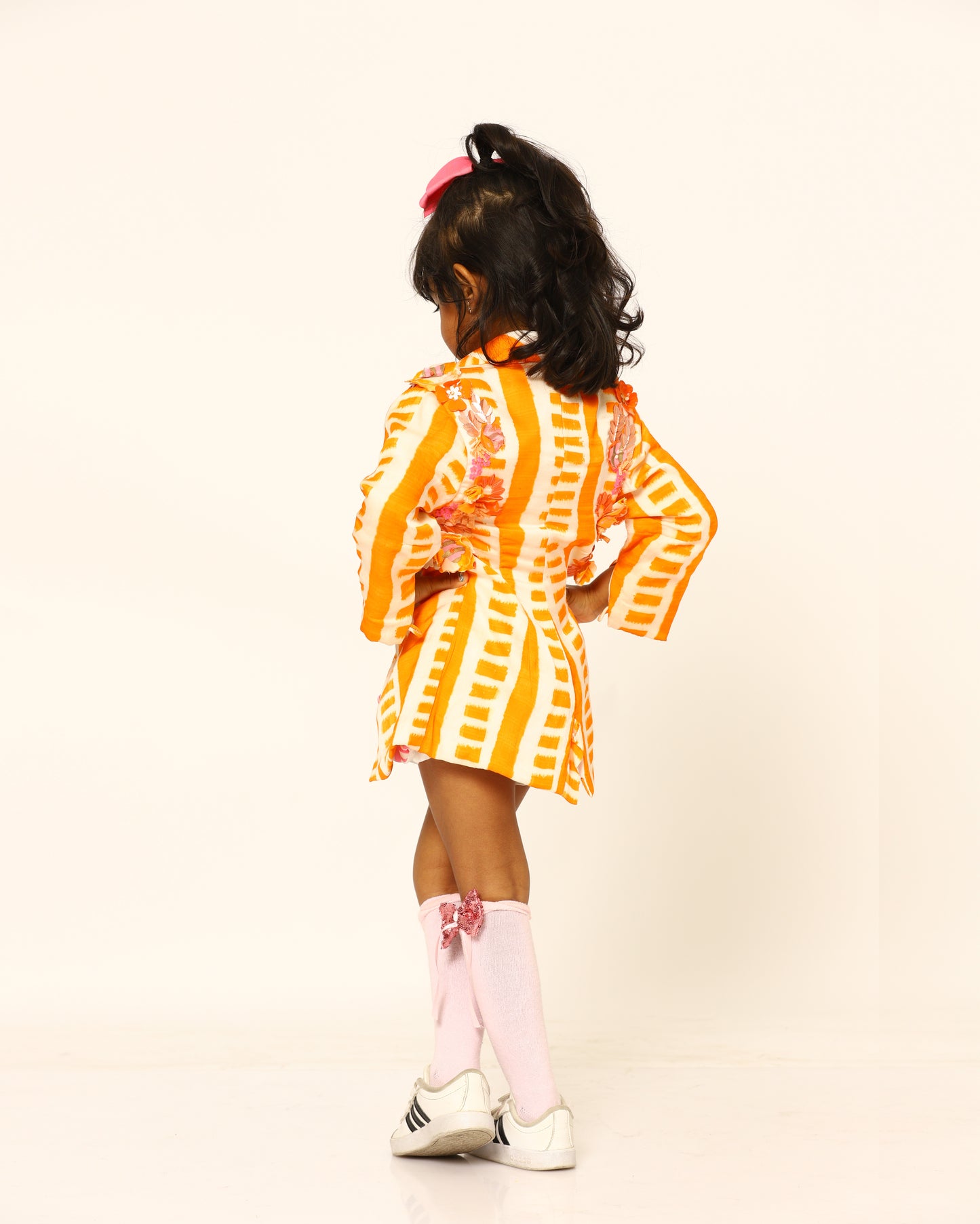 orange + candy + blazer + striped + flowers + pink + striped + skort + bow + socks + shoe + party + cheerful + jump + back